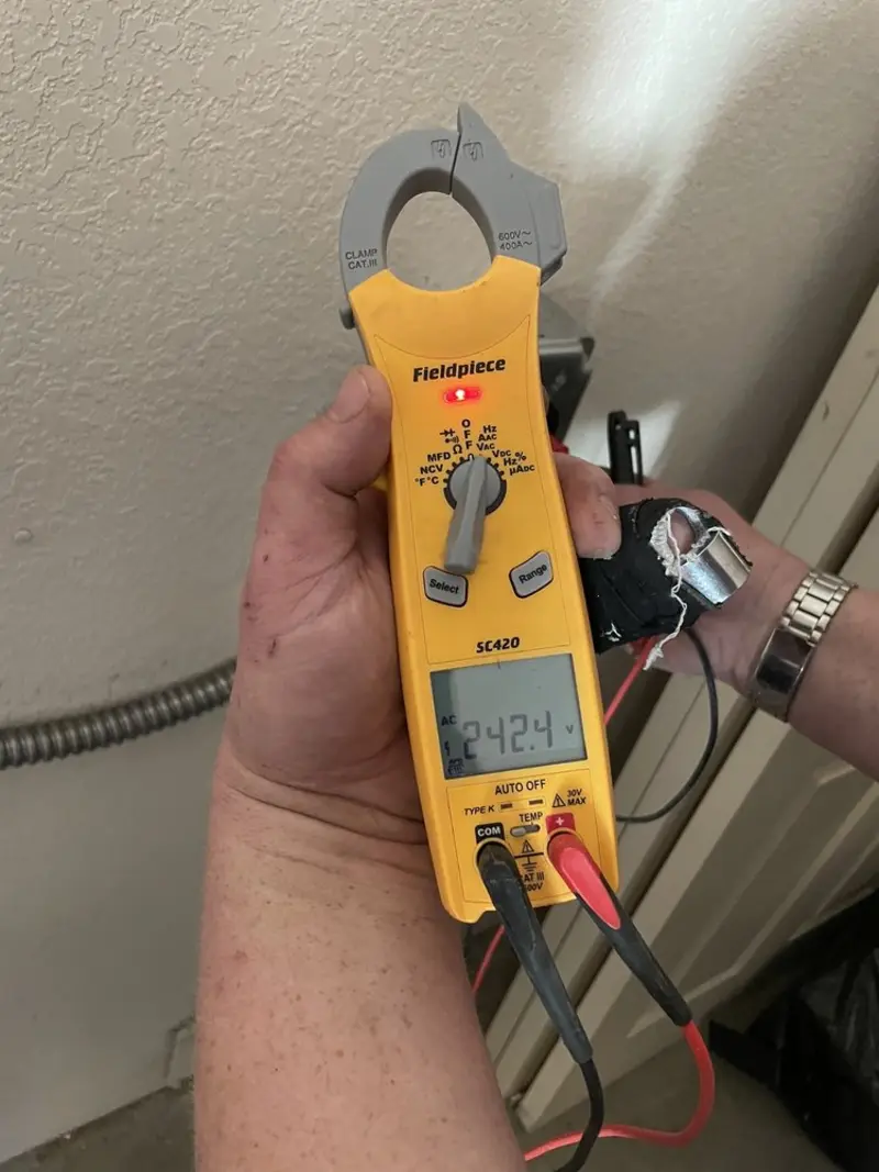 Voltage testing with clamp meter during Aluminum Wiring Replacement in Glendive